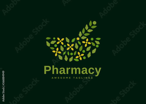 leaf and flower as Mortar and pestle symbol for herbal medicine, therapy, pharmacy logo