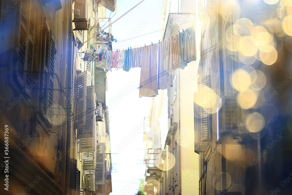 linen is dried in a narrow street of Italy, Italian lifestyle