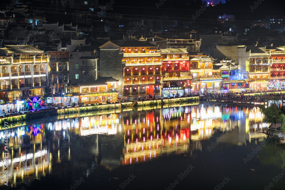 Fototapeta premium Aerial night view of Phoenix Ancient Town, Fenghuang, China