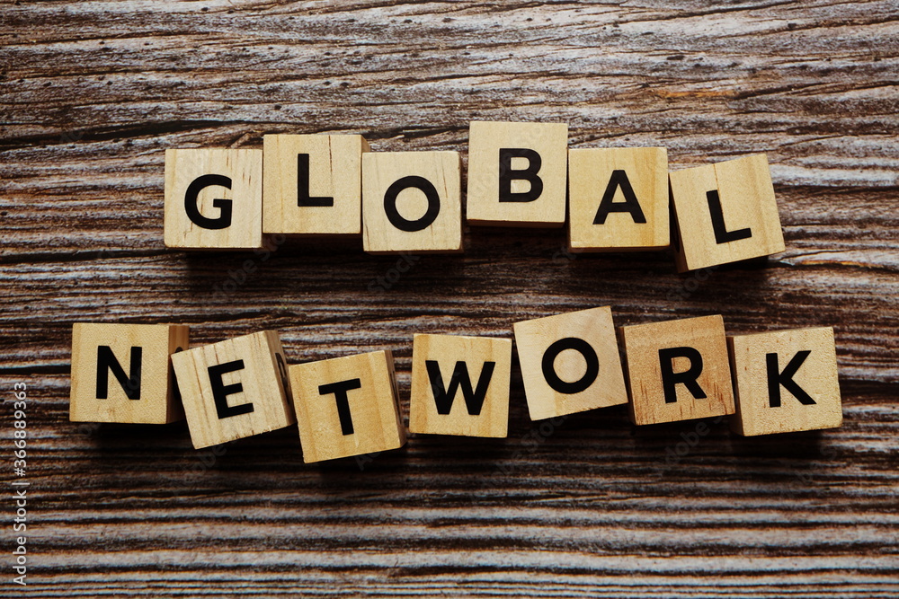 Fototapeta premium Global Network alphabet letter on wooden background