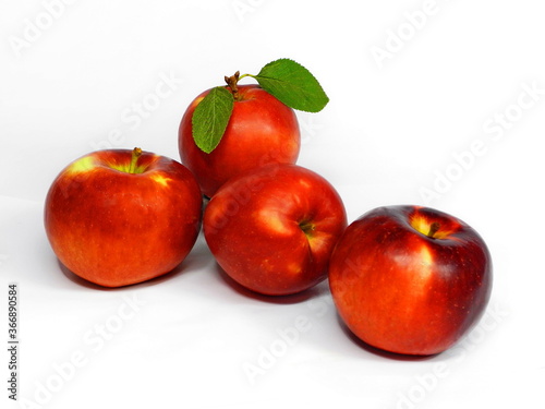 Red apples on white isolated background