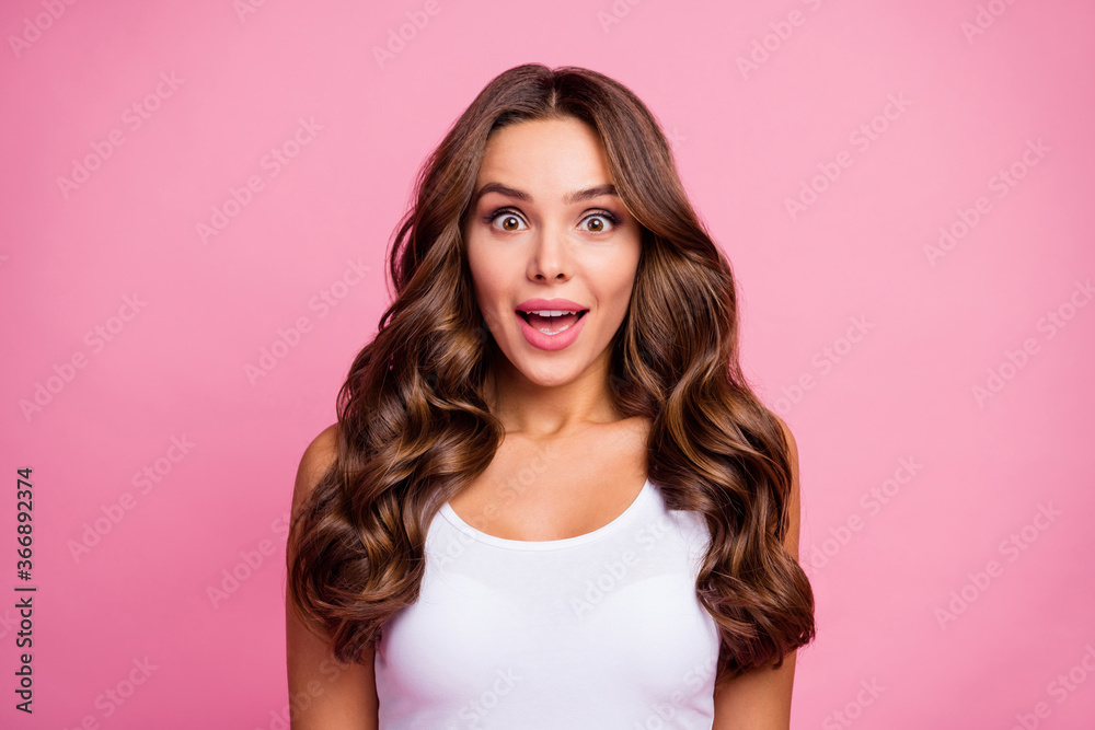 Photo of pretty funny wavy lady crazy facial expression open mouth listen cool news amazing successful day wear white casual singlet isolated bright pink color background Photo of pretty funny wavy lady crazy facial expression open mouth listen cool news amazing successful day wear white casual singlet isolated bright pink color background