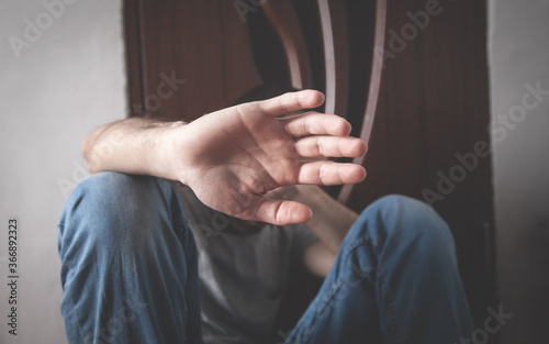 Caucasian depressed man making stop gesture. © andranik123
