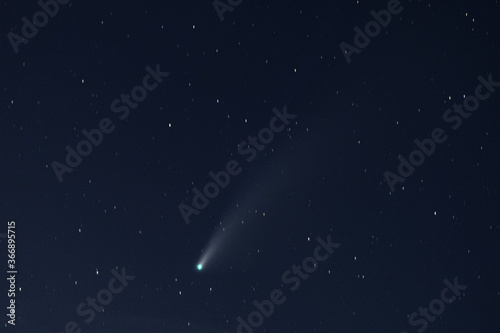 Neowise Comet ( C/2020 F3 )in cloudy night sky at 22 July , grain image