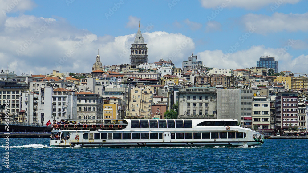 View to Galata district across Bay of Golden Horn on overcast day