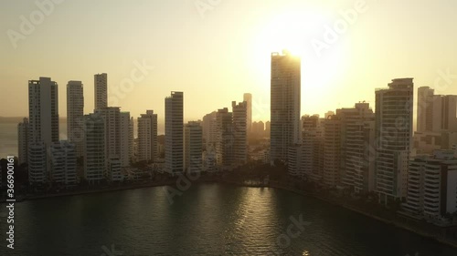 Wallpaper Mural Amazing sunset near modern skyscrapers business apartments hotels Cartagena Colombia aerial view. Torontodigital.ca