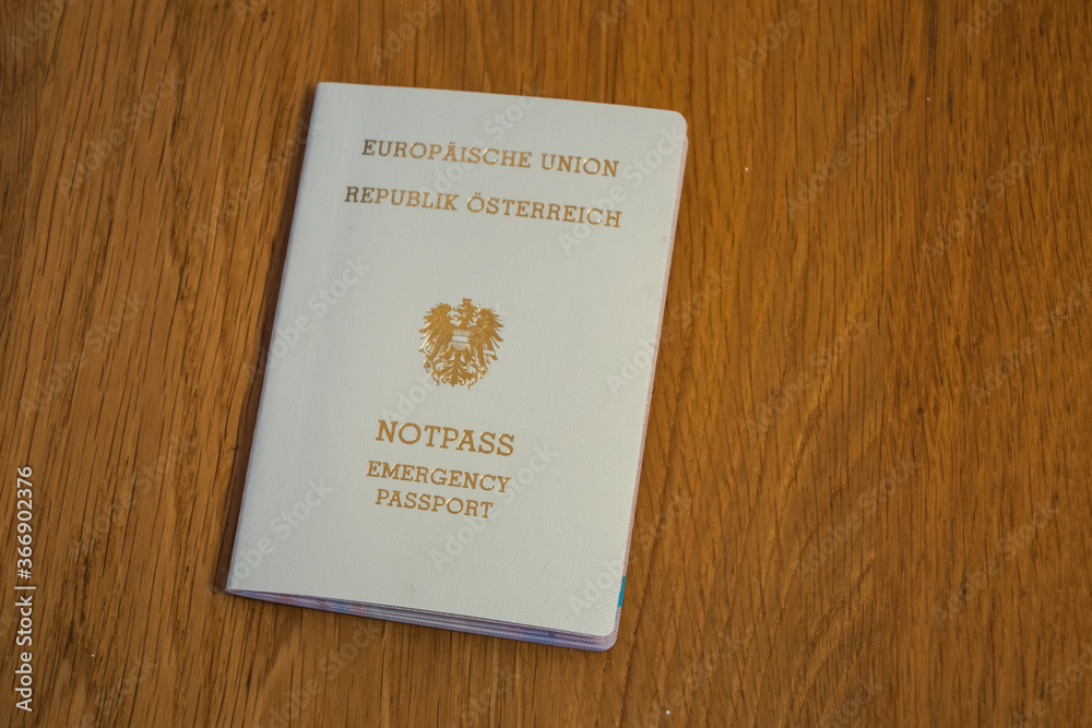 Foto Stock European Emergency Passport of the Republic of Austria - Cream  Colored Travel Document of the EU or European Union | Adobe Stock