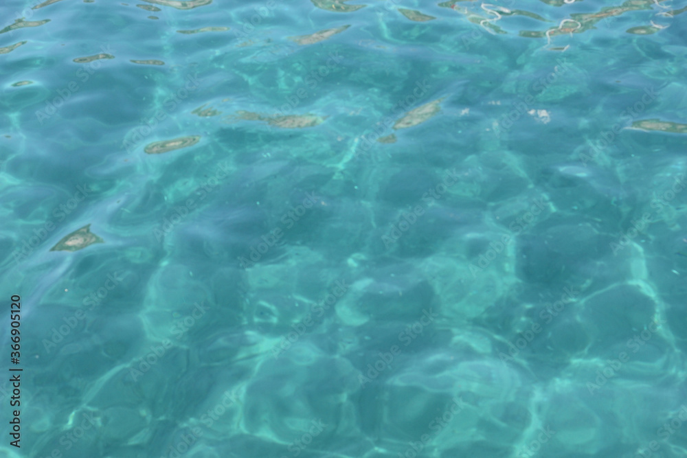 Alanya, TURKEY - August 10, 2013: Travel to Turkey. The waves of the Mediterranean Sea. Water surface.