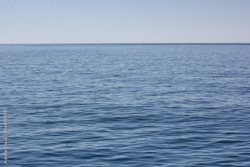 Alanya, TURKEY - August 10, 2013: Travel to Turkey. The waves of the Mediterranean Sea. Water surface.