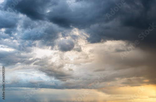 Dramatic storm sunset clouds skies heaven cloudscape background © matousekfoto