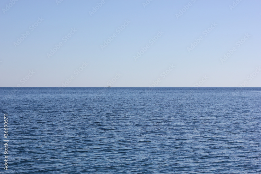 Alanya, TURKEY - August 10, 2013: Travel to Turkey. The waves of the Mediterranean Sea. Water surface. Alanya, TURKEY - August 10, 2013: Travel to Turkey. The waves of the Mediterranean Sea. Water surface.