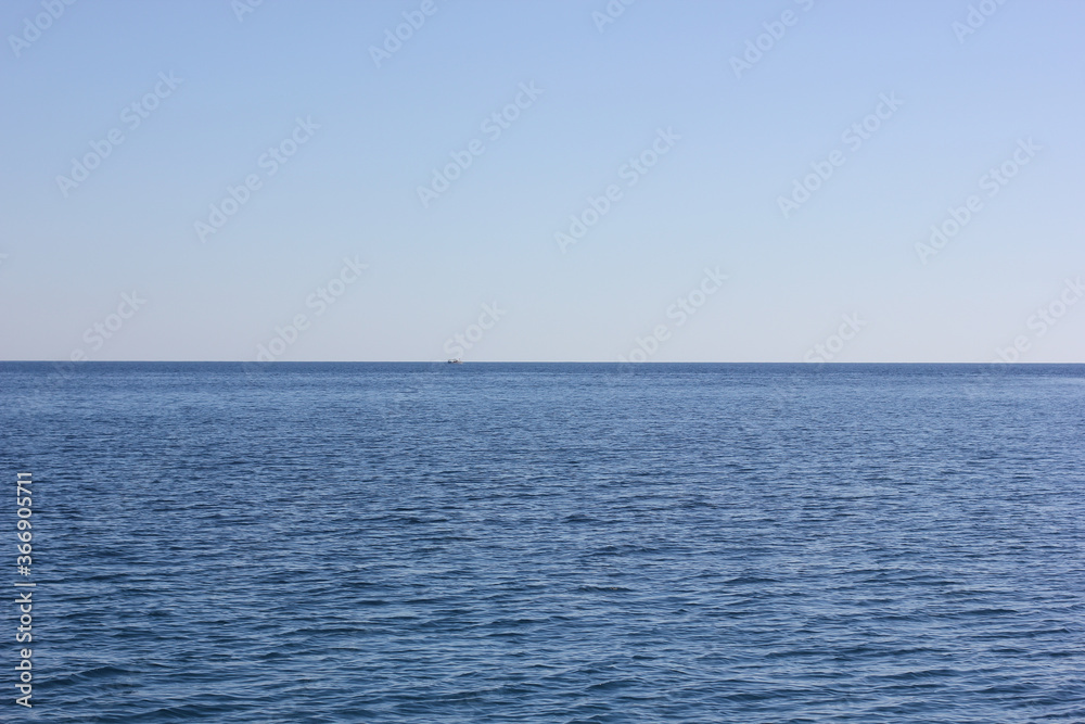 Alanya, TURKEY - August 10, 2013: Travel to Turkey. The waves of the Mediterranean Sea. Water surface.