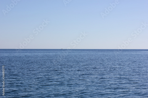 Alanya, TURKEY - August 10, 2013: Travel to Turkey. The waves of the Mediterranean Sea. Water surface.