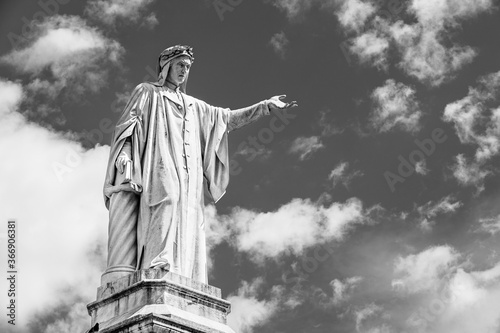 Monument to Dante Alighieri a 19th-century statue of the poet Dante sculpted by Tito Angelini located in Plazza Dante Naples  Italy