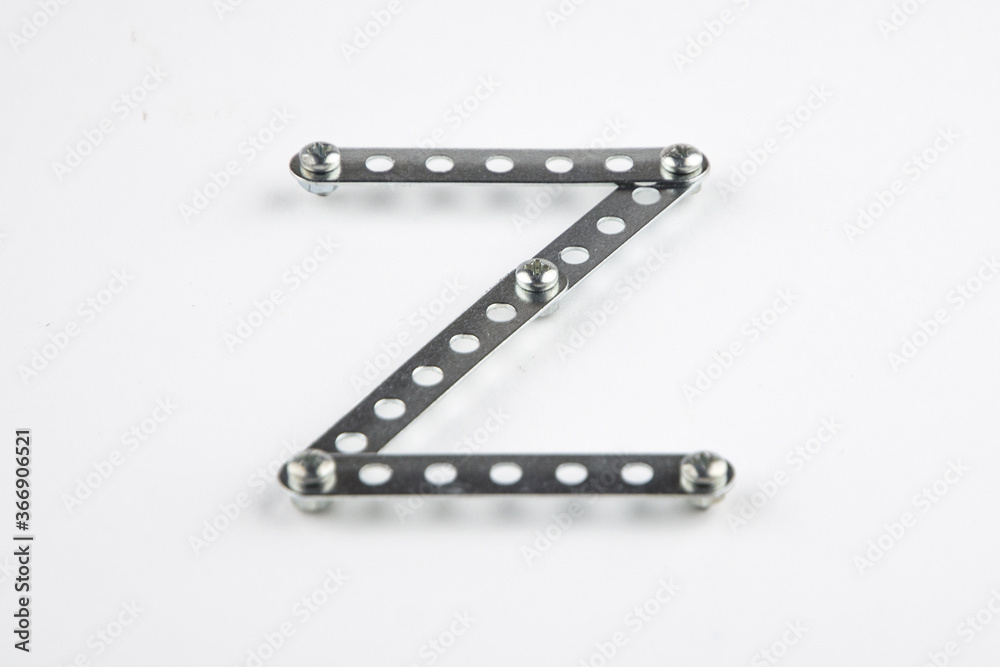 Letter Z from the English alphabet of Children's metal designer kit, front view from the top, a short focus on the center