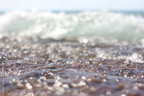 Fototapeta Naklejka Na Ścianę i Meble -  Alanya, TURKEY - August 10, 2013: Travel to Turkey. Beaches on the sea. Waves on the Mediterranean coast.
