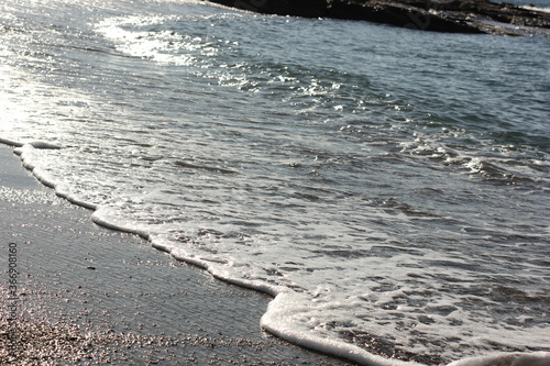 Fototapeta Naklejka Na Ścianę i Meble -  Alanya, TURKEY - August 10, 2013: Travel to Turkey. Beaches on the sea. Waves on the Mediterranean coast.