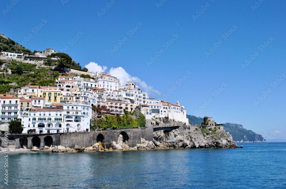 Coastline Amalfi old Italian town beautiful landscape blue sky sea bay high mountains clouds background