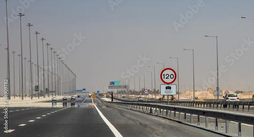 streets of Doha  Qatar  with traffic signs and finished infrastructure for 2022  traffic speed monitored by radar 