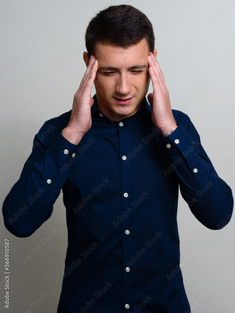 Portrait of handsome businessman against white background Portrait of handsome businessman against white background