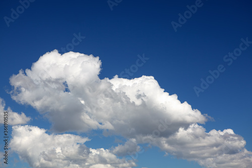 Summer typical clouds with deep blue sky