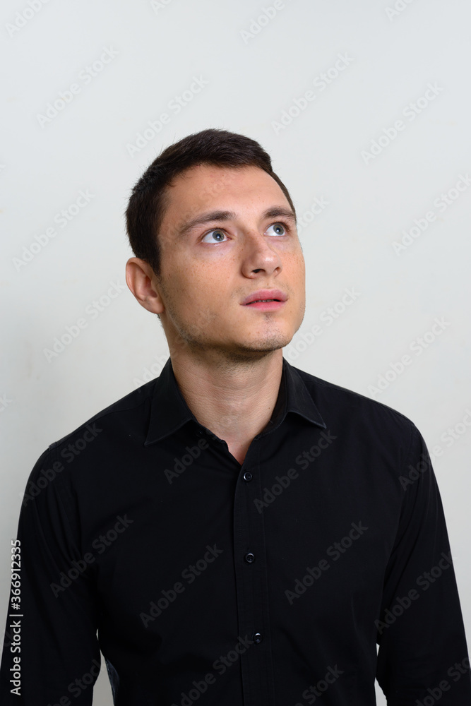 Portrait of handsome businessman against white background Portrait of handsome businessman against white background
