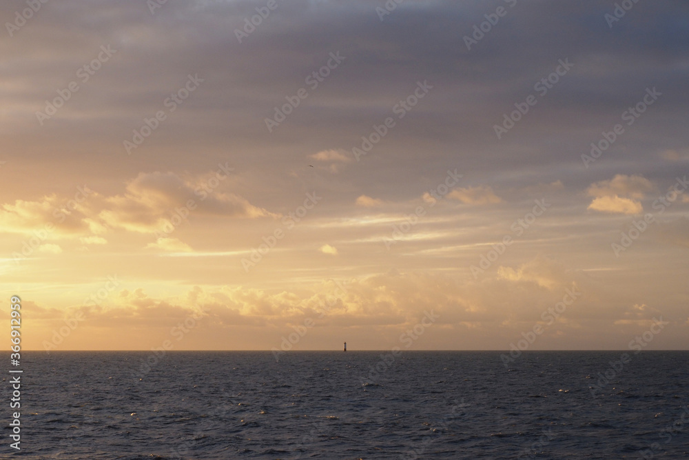 Coucher de soleil devant le phare