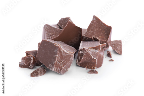 Pieces of milk chocolate isolated on white