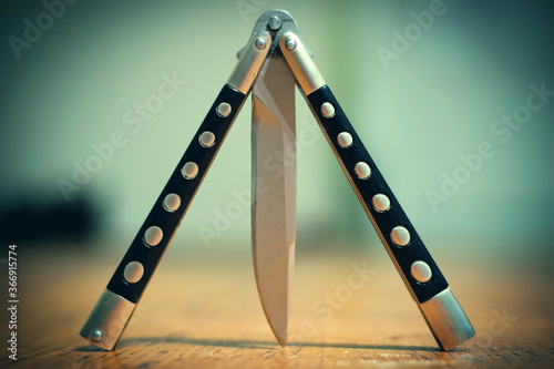 Butterfly knife on the table