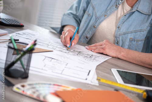 Female architect working on sketch