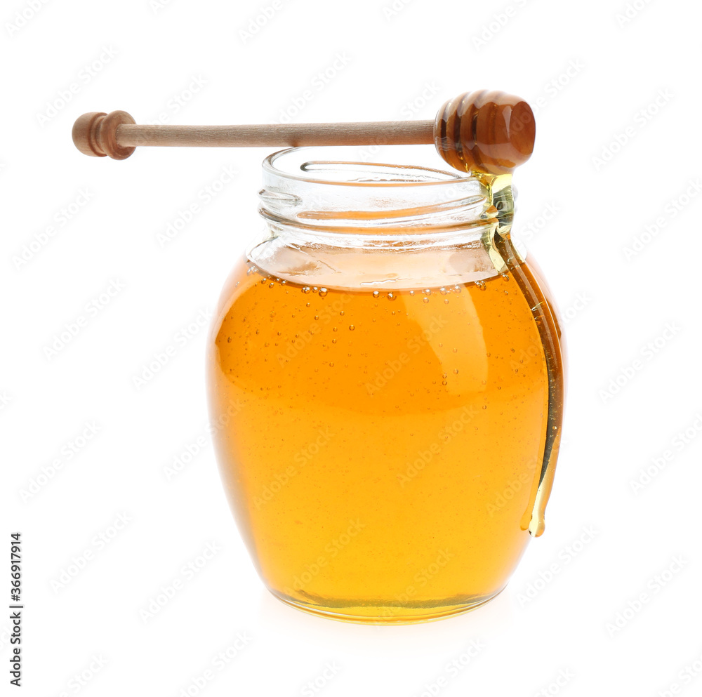 Fresh honey in jar and dipper on white background Fresh honey in jar and dipper on white background