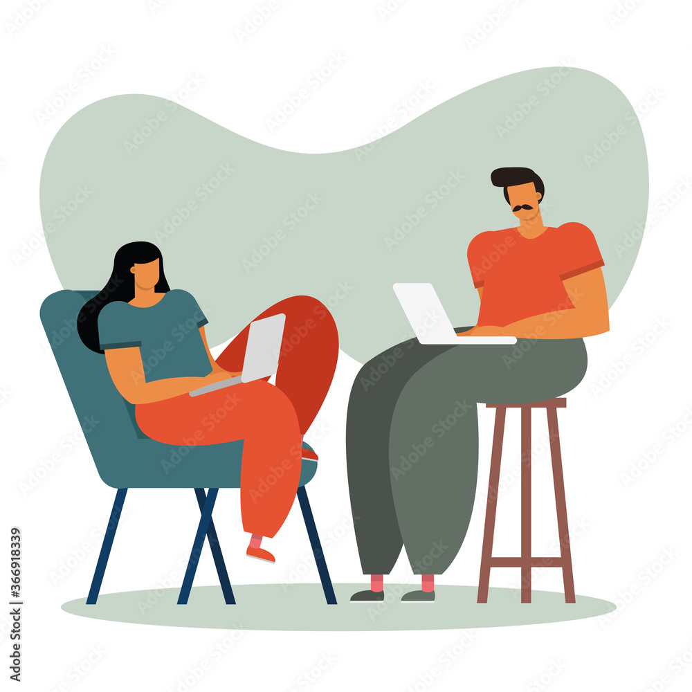 young couple using laptops working in the house young couple using laptops working in the house
