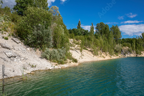 Excavation lake by a limestone quarry, Piechcin, Poland photo