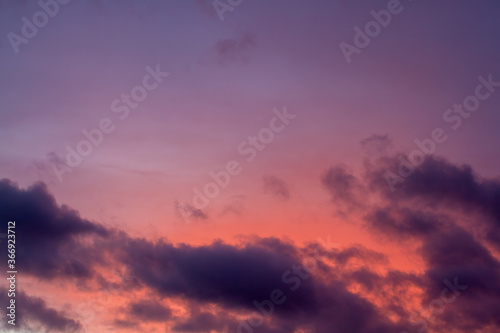 Sunset. Dark clouds, vanilla, purple sky.