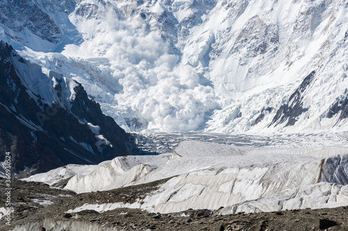 Avalanche coming down near Base Camp, Pabeda-Khan Tengry glacier massif, Central Tien Shan Mountain Range, Border of Kyrgyzstan and China, Kyrgyzstan, Asia