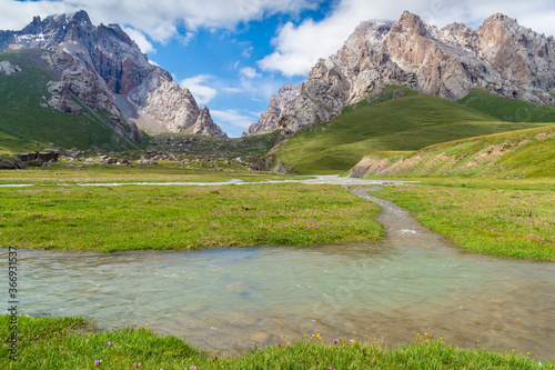 River coming from Köl-Suu mountain range, Kurumduk valley, Naryn province, Kyrgyzstan, Central Asia photo