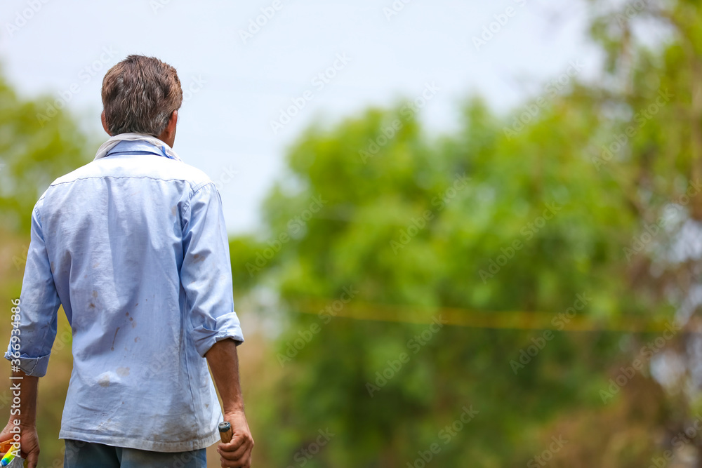 Indian farmer at his agriculture field Indian farmer at his agriculture field