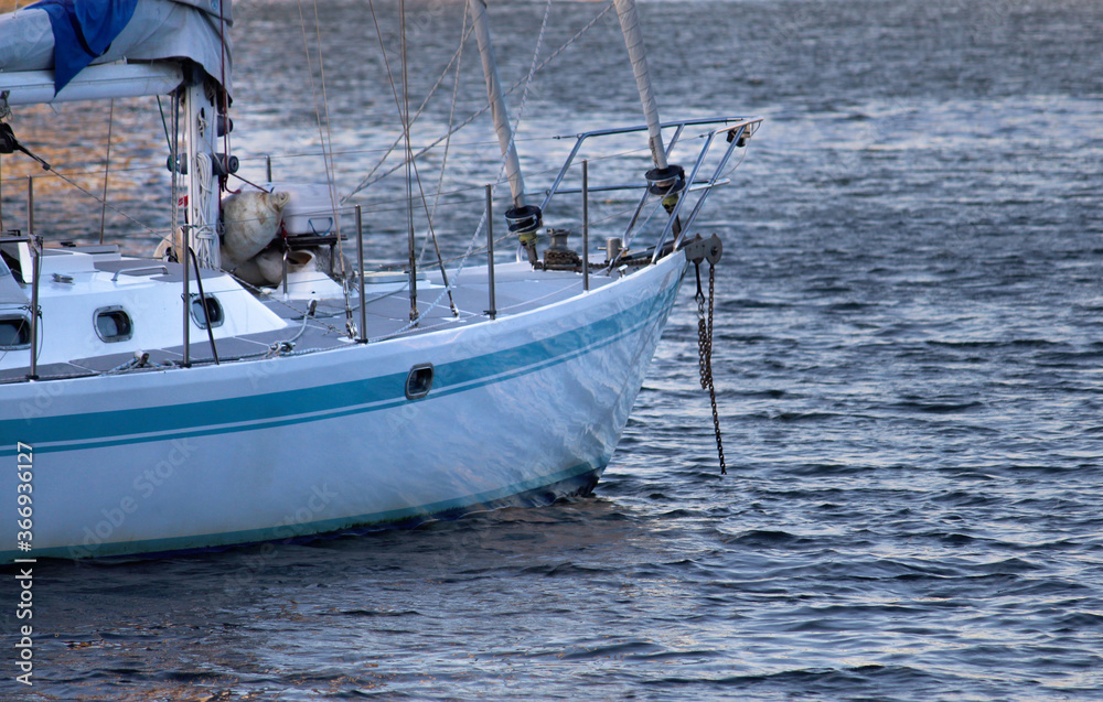 Fototapeta premium Front part or bow of a yacht on an over cast grey day