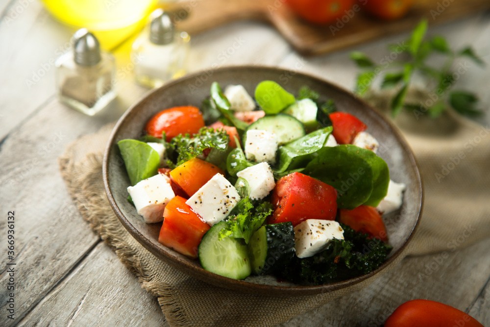 Traditional Greek salad with fresh spinach Traditional Greek salad with fresh spinach