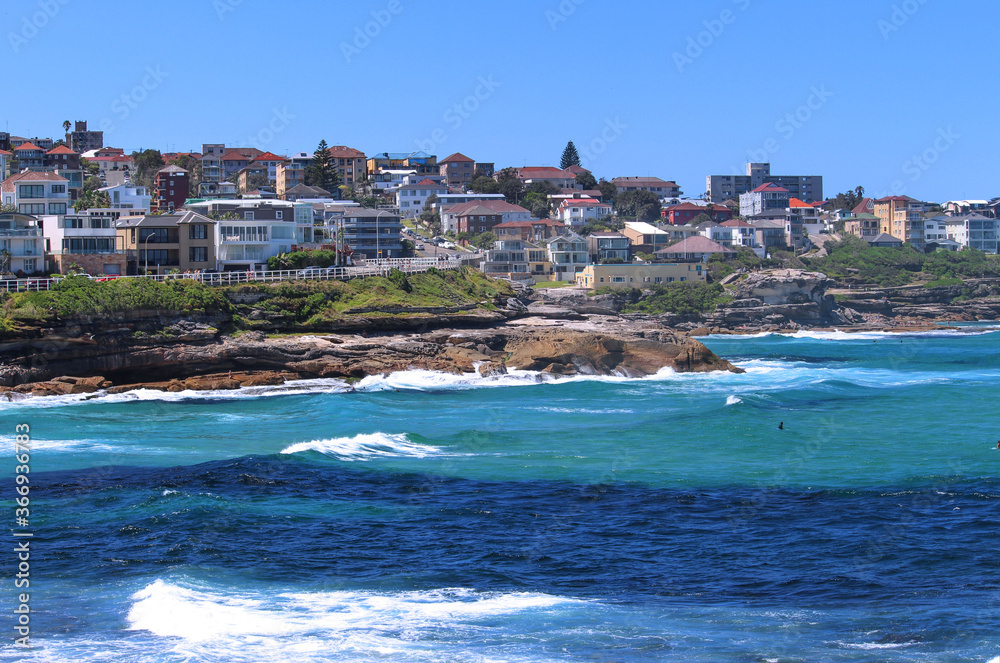 Coastline with buildings cliffs and waves in summer. Eastern Suburbs Sydney