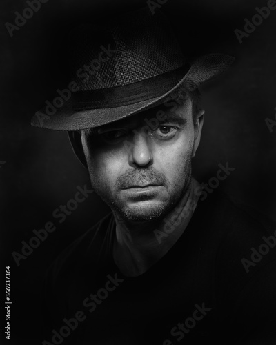 portrait of a man in hat