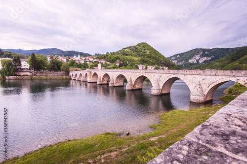 Historic bridge over the Drina River, Famous Tourist Attraction, The Mehmed Pasa Sokolovic Bridge in Visegrad, Bosnia and Herzegovina © mitarart
