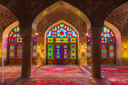 Nasir-ol-Molk Mosque or Pink Mosque, Light patterns from colored stained glass illuminating the iwan, Shiraz, Fars Province, Iran, Asia photo