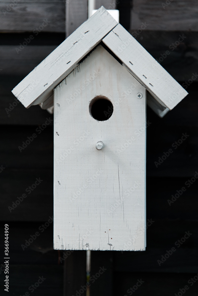 White bird booth (bird house) - a garden decoration