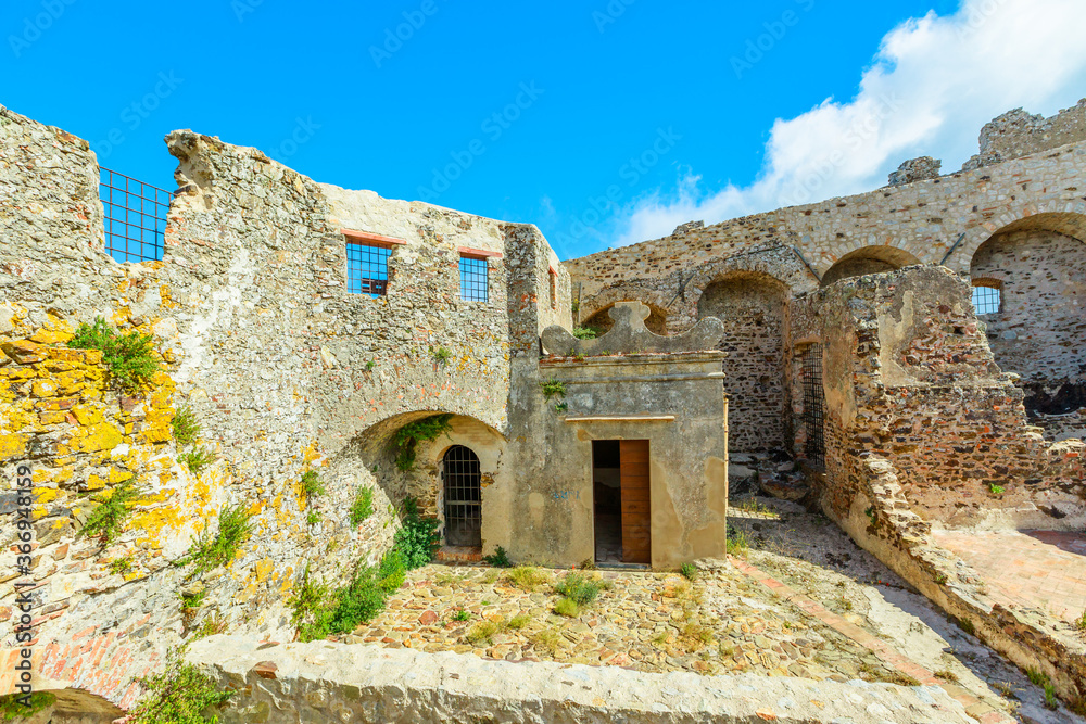 Arcade walls and windows of the Volterraio Castle, the oldest fortress on Elba Island, Tuscany, Italy. the never conquered italian castle in all history.