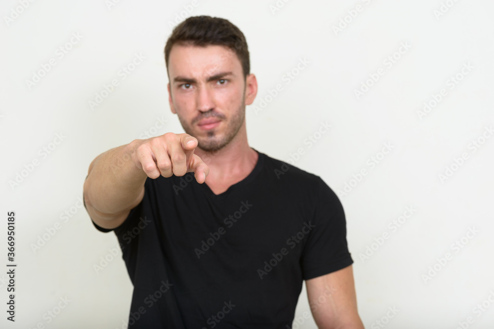 Portrait of handsome bearded man against white background Portrait of handsome bearded man against white background