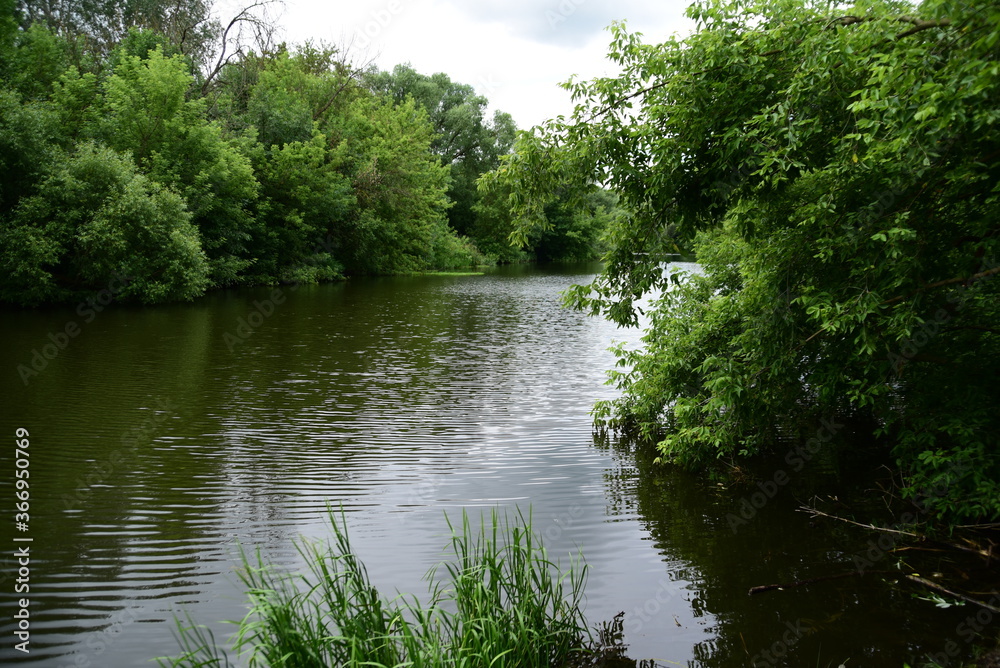 a quiet river with picturesque banks a quiet river with picturesque banks