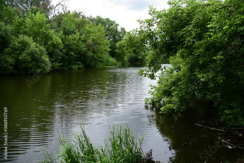 a quiet river with picturesque banks