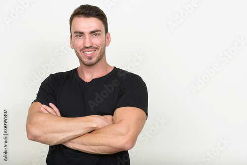 Portrait of handsome bearded man against white background