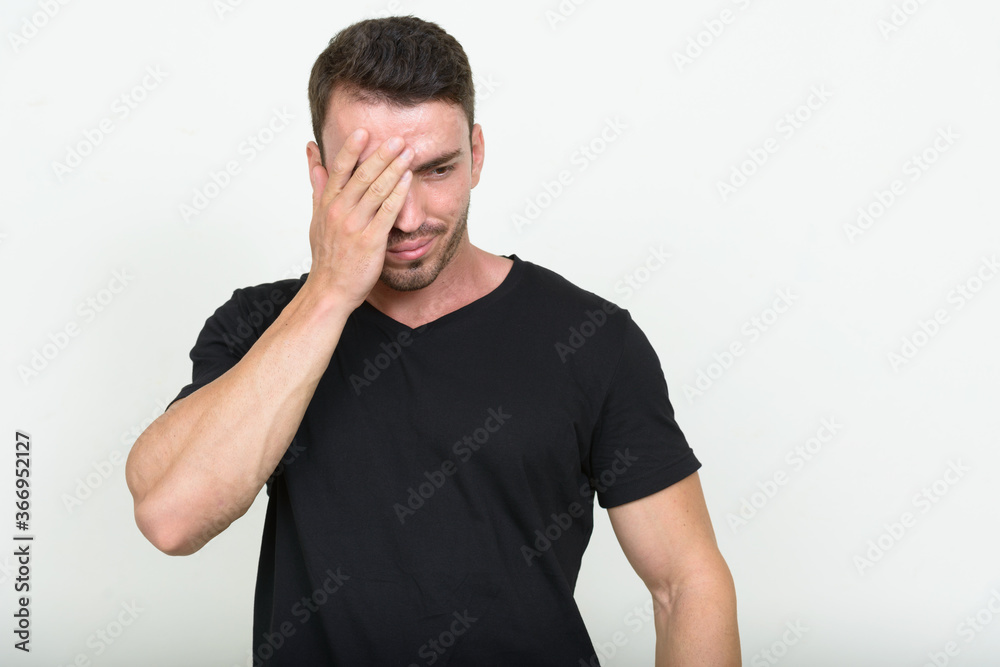 Portrait of handsome bearded man against white background Portrait of handsome bearded man against white background